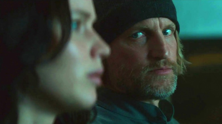 Haymitch looking at Katniss