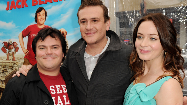 Jason Segel, Jack Black, and Emily Blunt standing together