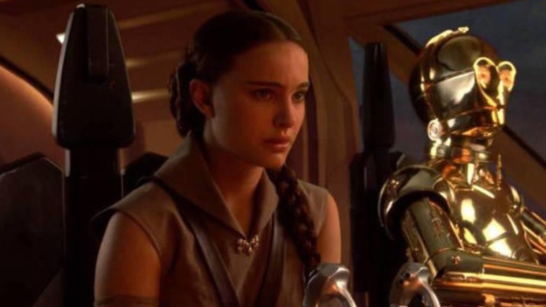 Padme sitting next to C-3PO