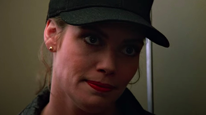 Kelly McGillis wearing baseball cap