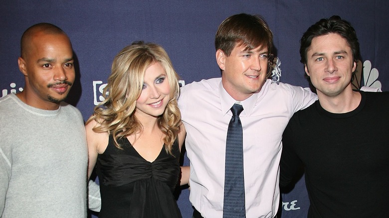 Donald Faison, Sarah Chalke, Bill Lawrence, and Zach Braff posing