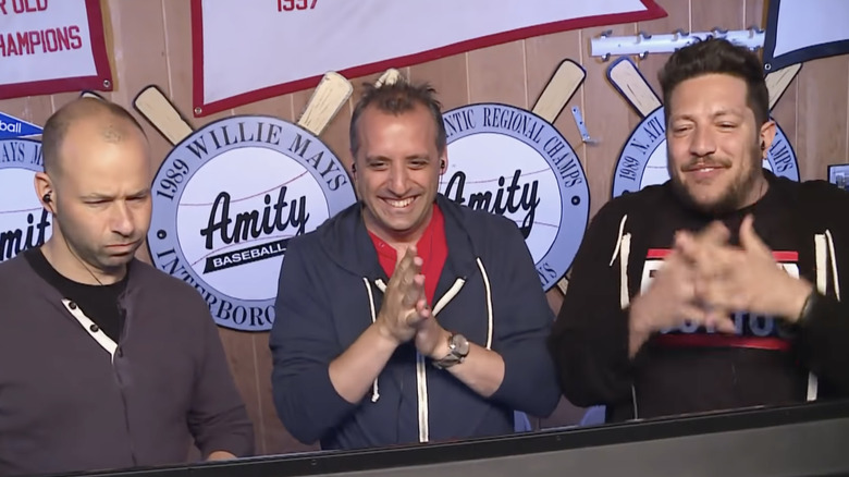 the cast of impractical jokers laughing at Q's punishment