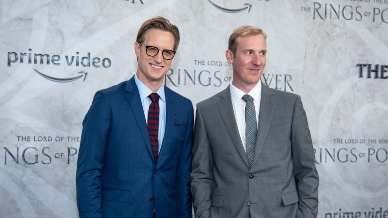 J.D. Payne and Patrick McKay smiling at the premiere of The Rings of Power