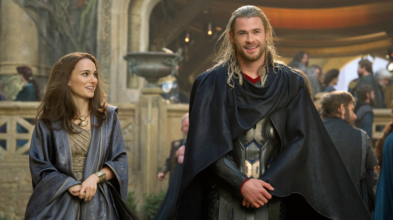 Jane Foster and Thor walking through Asgard