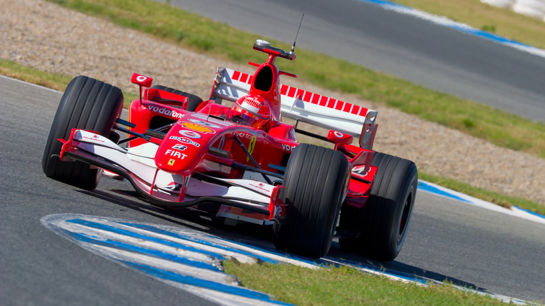 Michael Schumacher driving red car