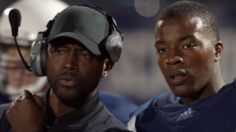 Spencer and Coach Baker on the sideline