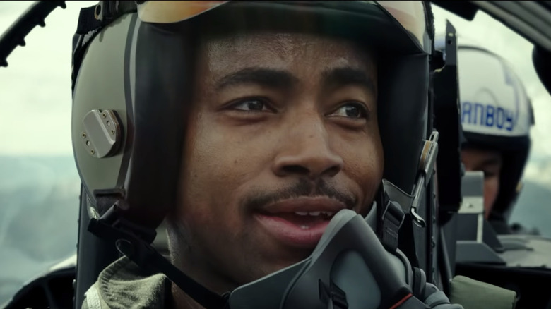 Jay Ellis sits in the cockpit of a fighter jet in Top Gun: Maverick