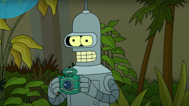 Bender holding a camera