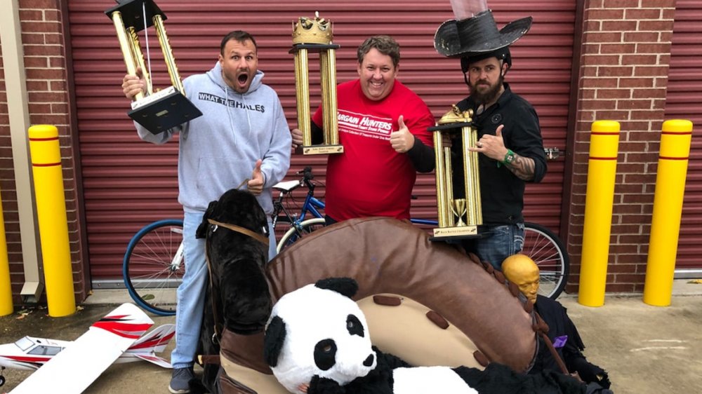 Rene Nezhoda with the stars of Dude Perfect after inadvertently purchasing one of their storage units