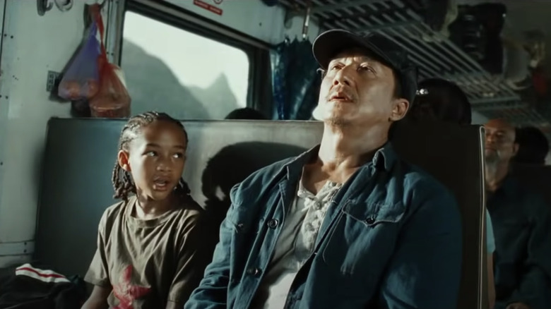 Jaden Smith and Jackie Chan on train