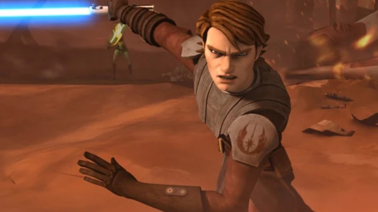 Anakin Skywalker holding his lightsaber