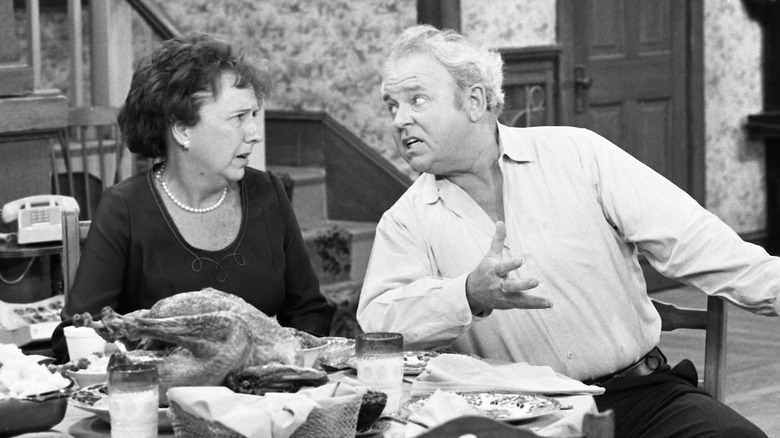 Edith and Archie Bunker arguing