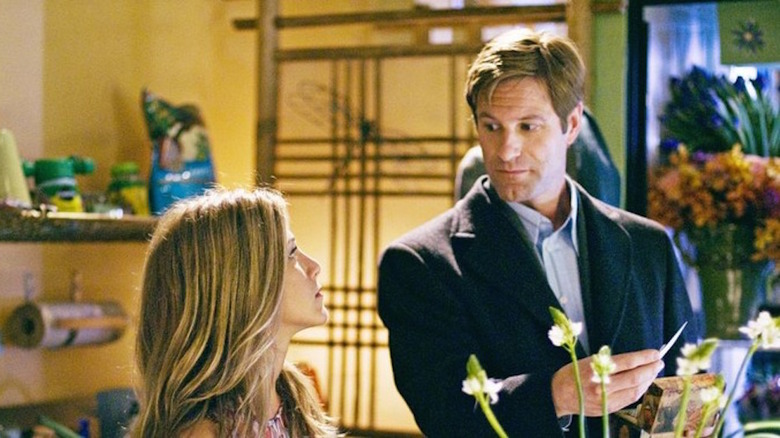 Jennifer Aniston and Aaron Eckhart in flower shop