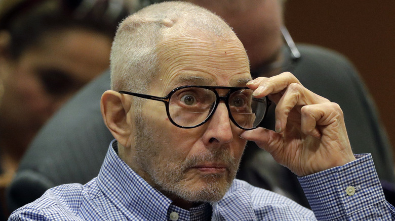 Robert Durst wearing glasses