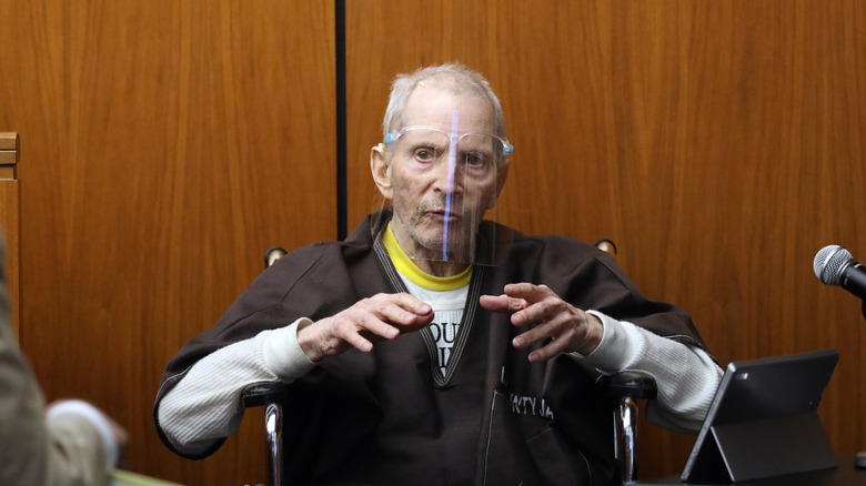 Robert Durst prison clothes visor