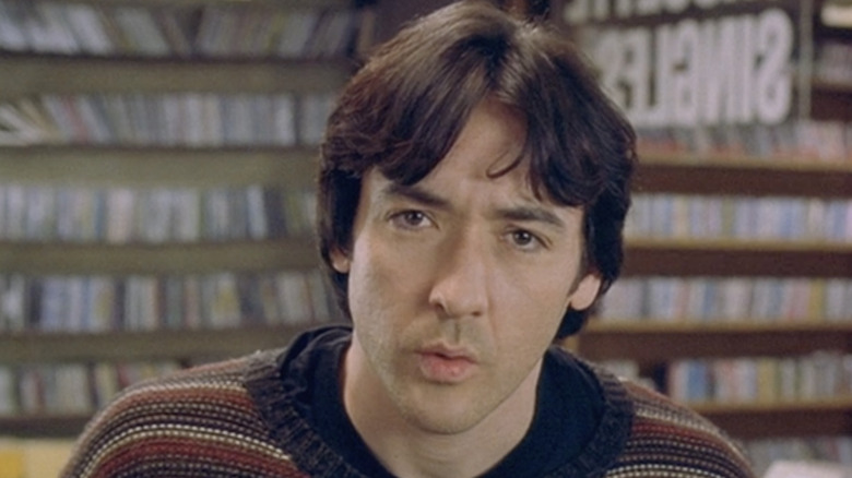 John Cusack looks at camera