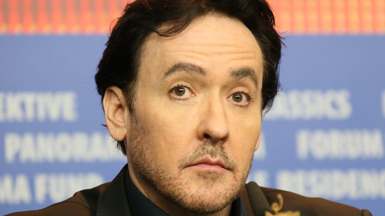 John Cusack looks concerned