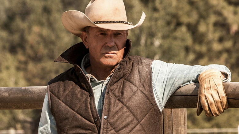 John Dutton leans on a fence post on Yellowstone (2018-2024)