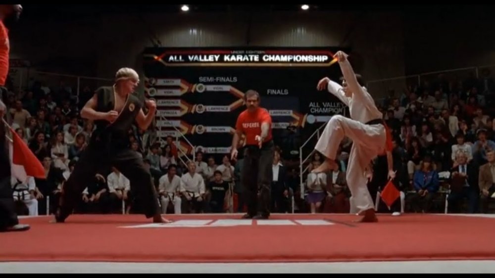 Billy Zabka as Johnny Lawrence and Ralph Macchio as Daniel LaRusso in The Karate Kid