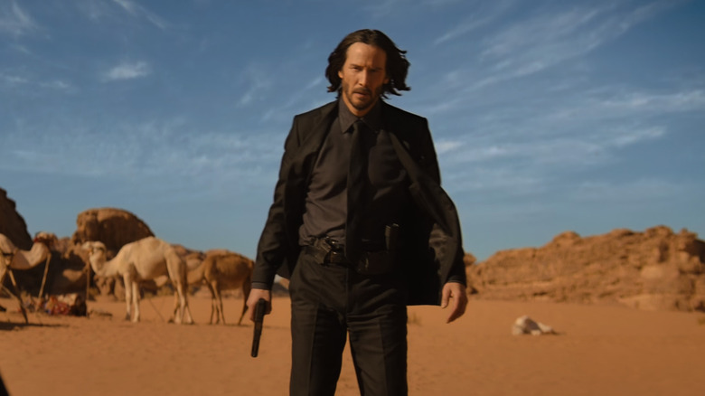 John Wick standing in desert