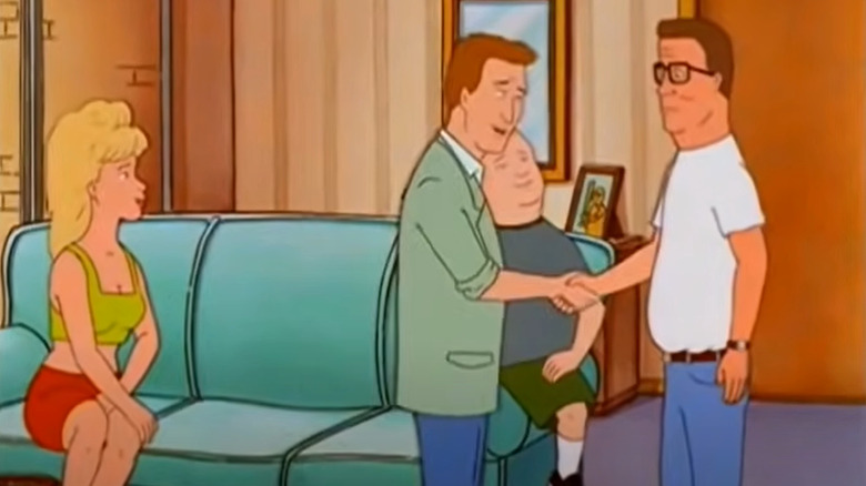 Rad shakes Hank's hand