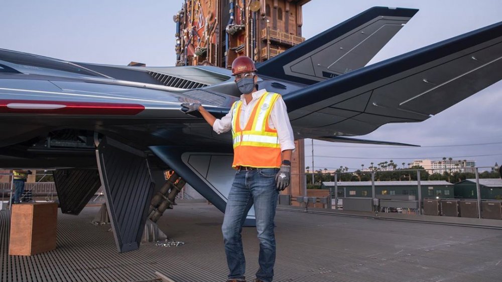 Josh D'Amaro stands beside the Quinjet