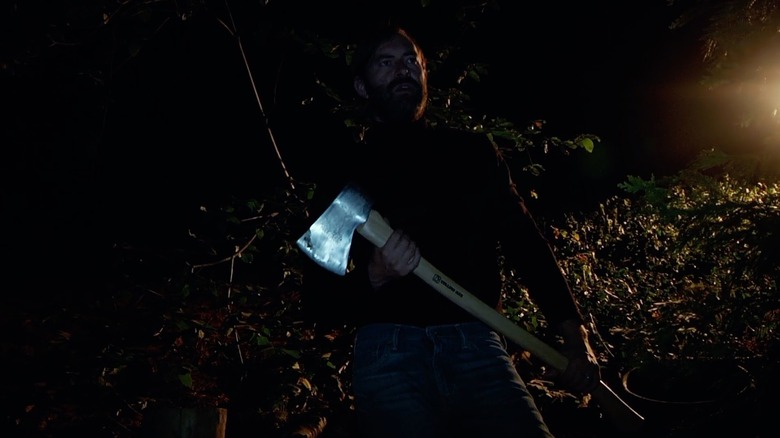 Aaron holding axe