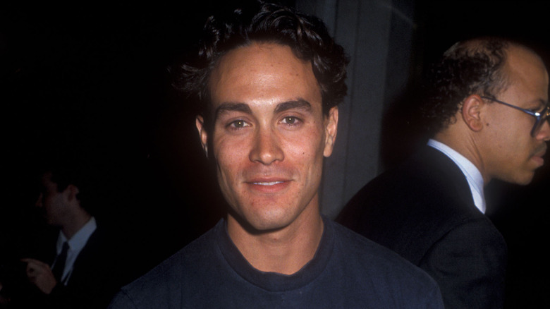 Brandon Lee smiling in t-shirt