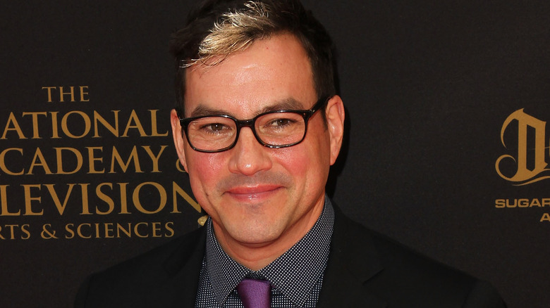 Tyler Christopher smiling in purple tie