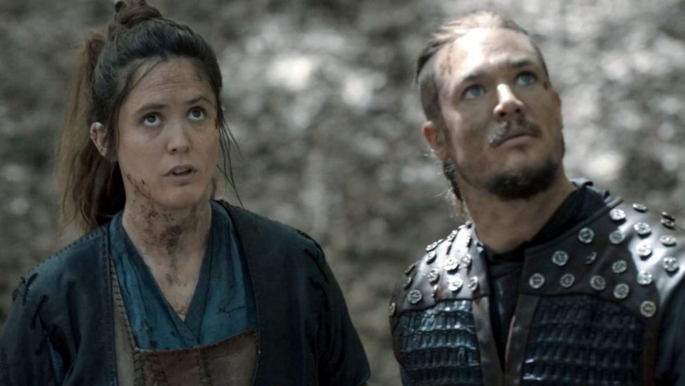 Alexander Dreymon as Uhtred and Emily Cox as Brida on The Last Kingdom