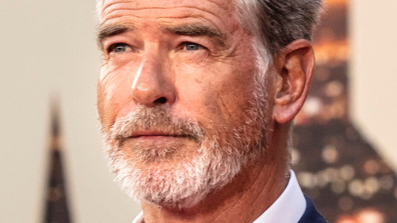 Pierce Brosnan staring seriously 