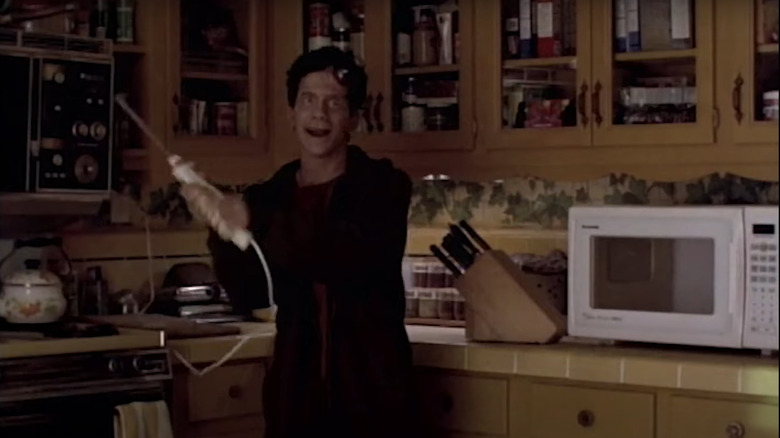 Seth Green pretends to be Leatherface in Idle Hands 