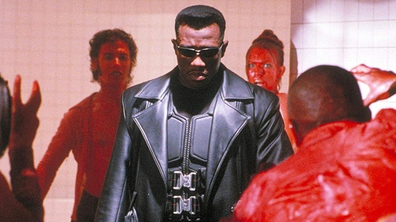 Blade surrounded by bloody vampires