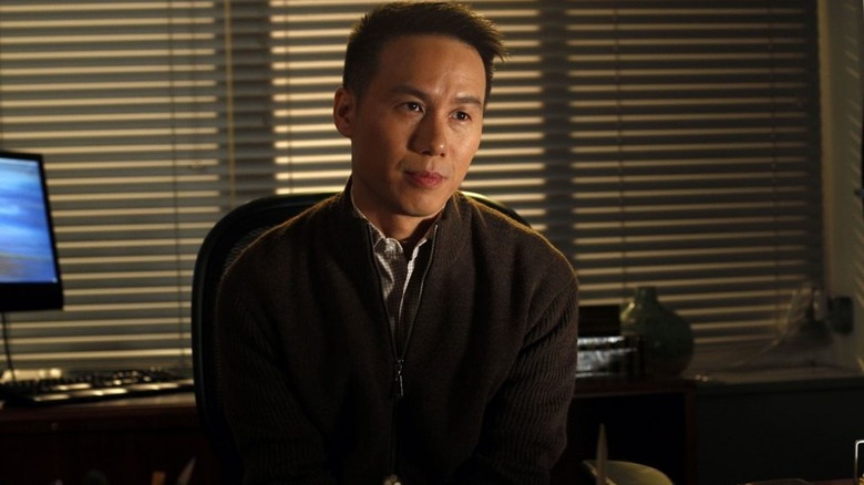 Dr. George Huang at his desk