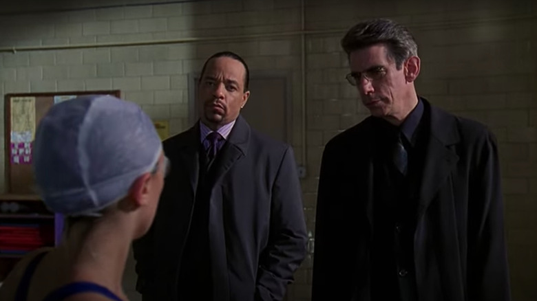 Fin Tutuola and John Munch looking angry