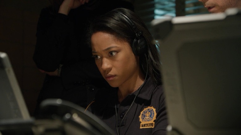 Tabitha Holbert as a Taru Tech agent on Blue Bloods