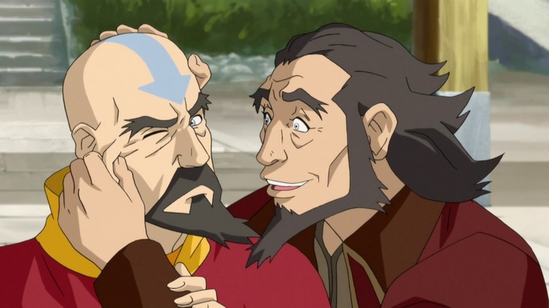 Bumi pinching Tenzin's cheek