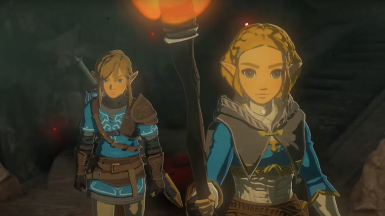 Zelda holding fire Link walking