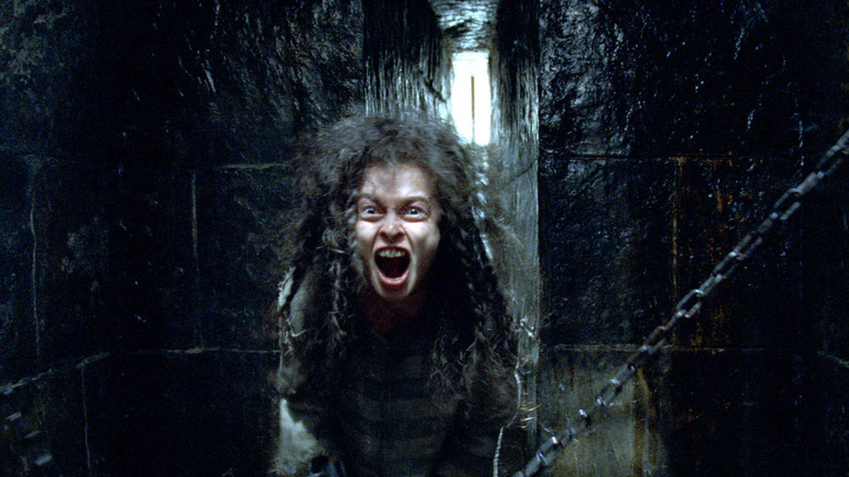 Bellatrix in chains in Azkaban screaming in Harry Potter and the Order of the Phoenix