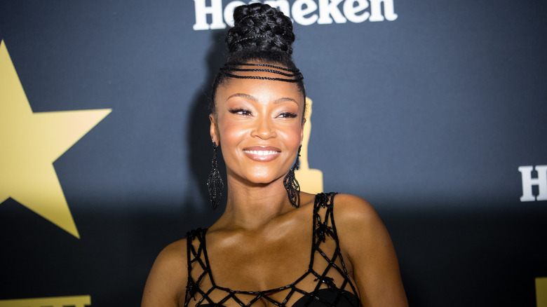 Yaya DaCosta smiling for a photo