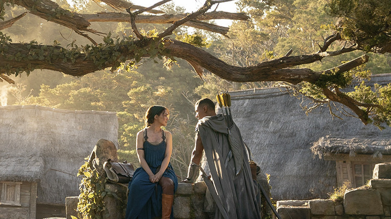 Bronwyn and Arondir sitting under a tree