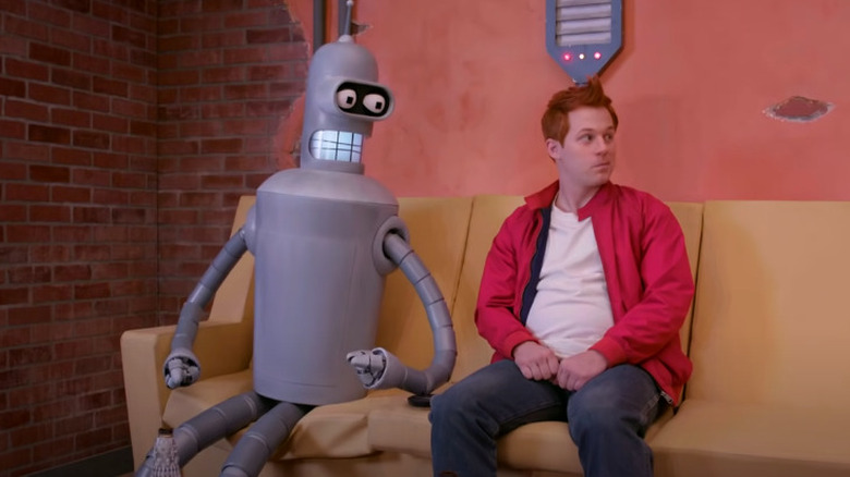 Bender and Fry sitting on the sofa