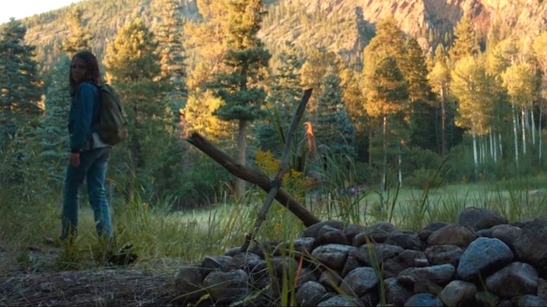 Laura leaving Logan's grave