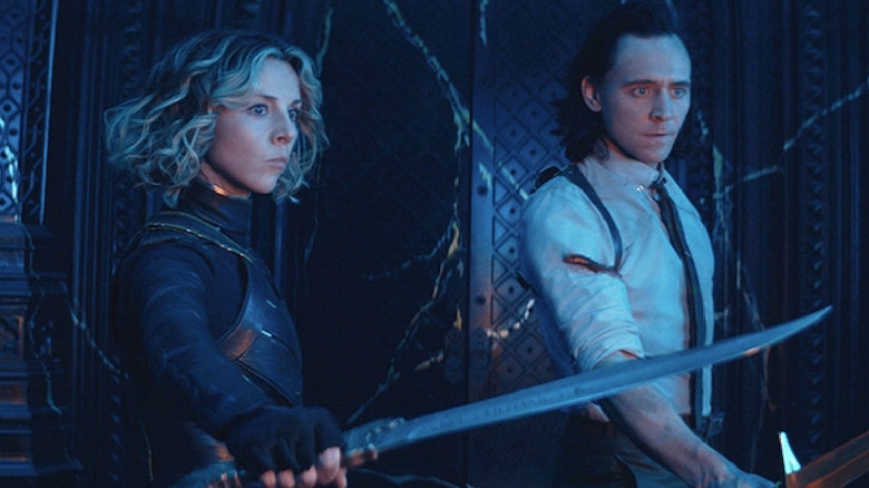 Sylvie and Loki holding swords