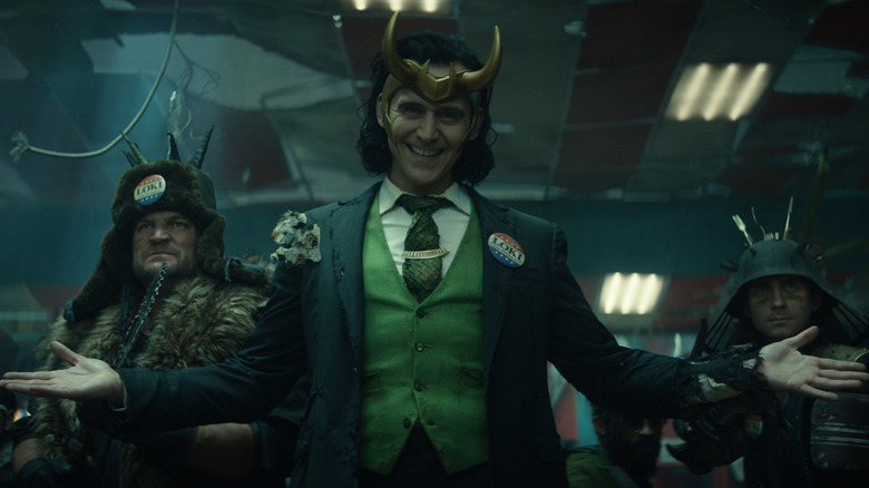 President Loki smiling arms outstretched