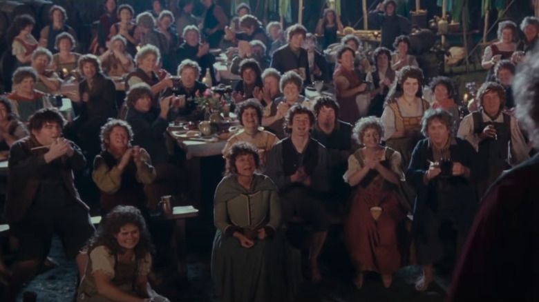 A Hobbit crowd at Bilbo's birthday party in "The Fellowship of the Ring" (2001)