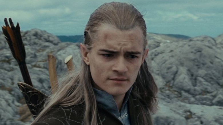 Legolas looks down pensively