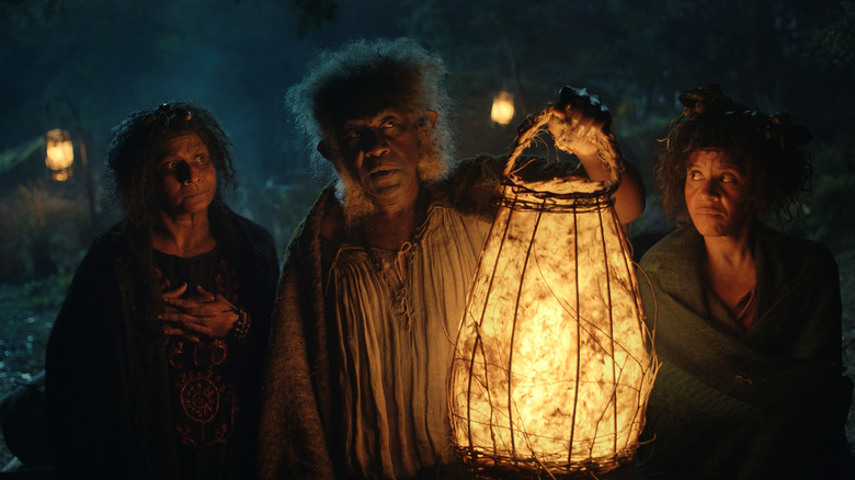 Sadoc Burrows holding a lantern