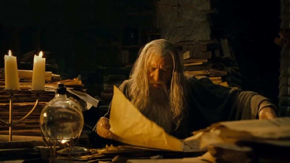 Gandalf studies the past