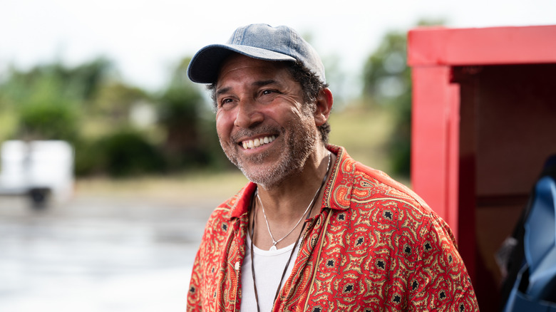 Oscar Nunez smiling in "The Lost City"